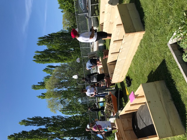Volunteers building raised garden beds at the Osoyoos Community Garden
