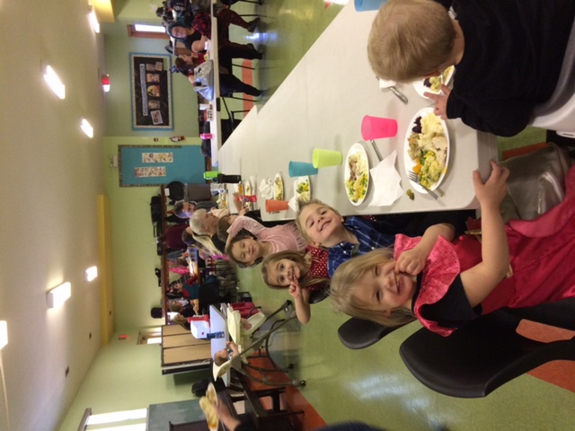 Children sharing a meal together in a safe, welcoming Desert Sun space